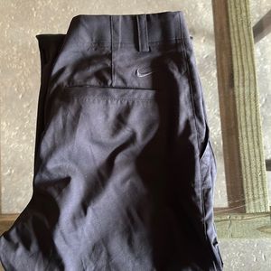 Men’s Nike Dri-Fit black pants.  Waist is 30in and inseam is 34in.